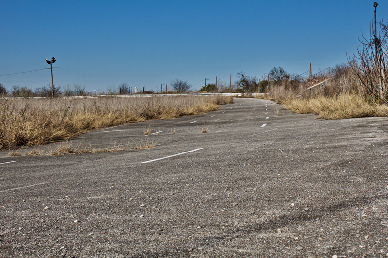 The backstretch that local and touring race cars used to come around to, meeting more than one set of grandstands as they did.